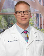 Thomas Sloane. Guy, MD
