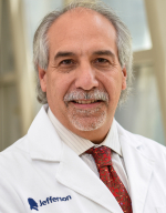 Louis E. Samuels, MD Louis E. Samuels, MD
